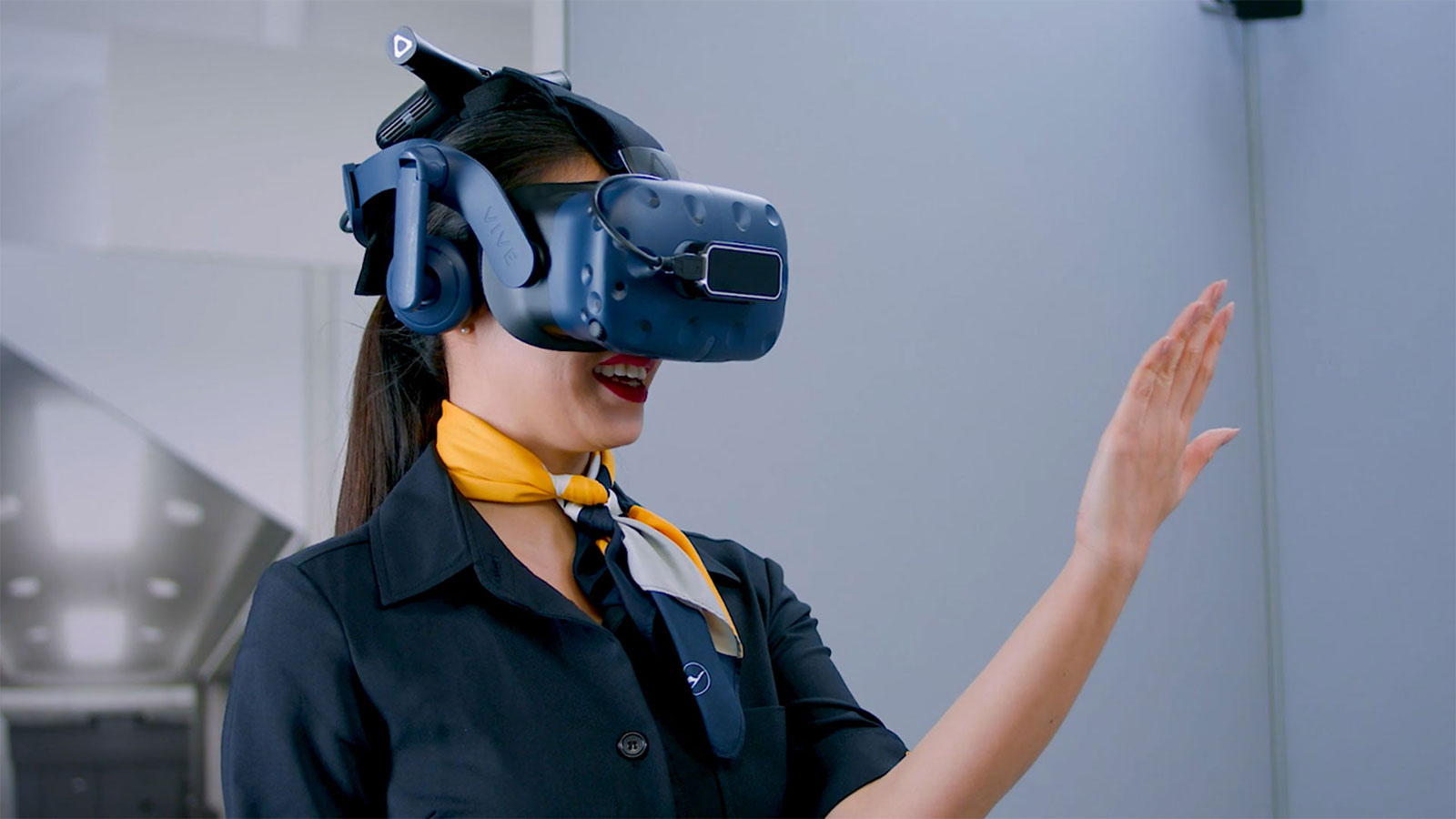 Lufthansa cabin crew member using Ultraleap hand tracking for VR Training