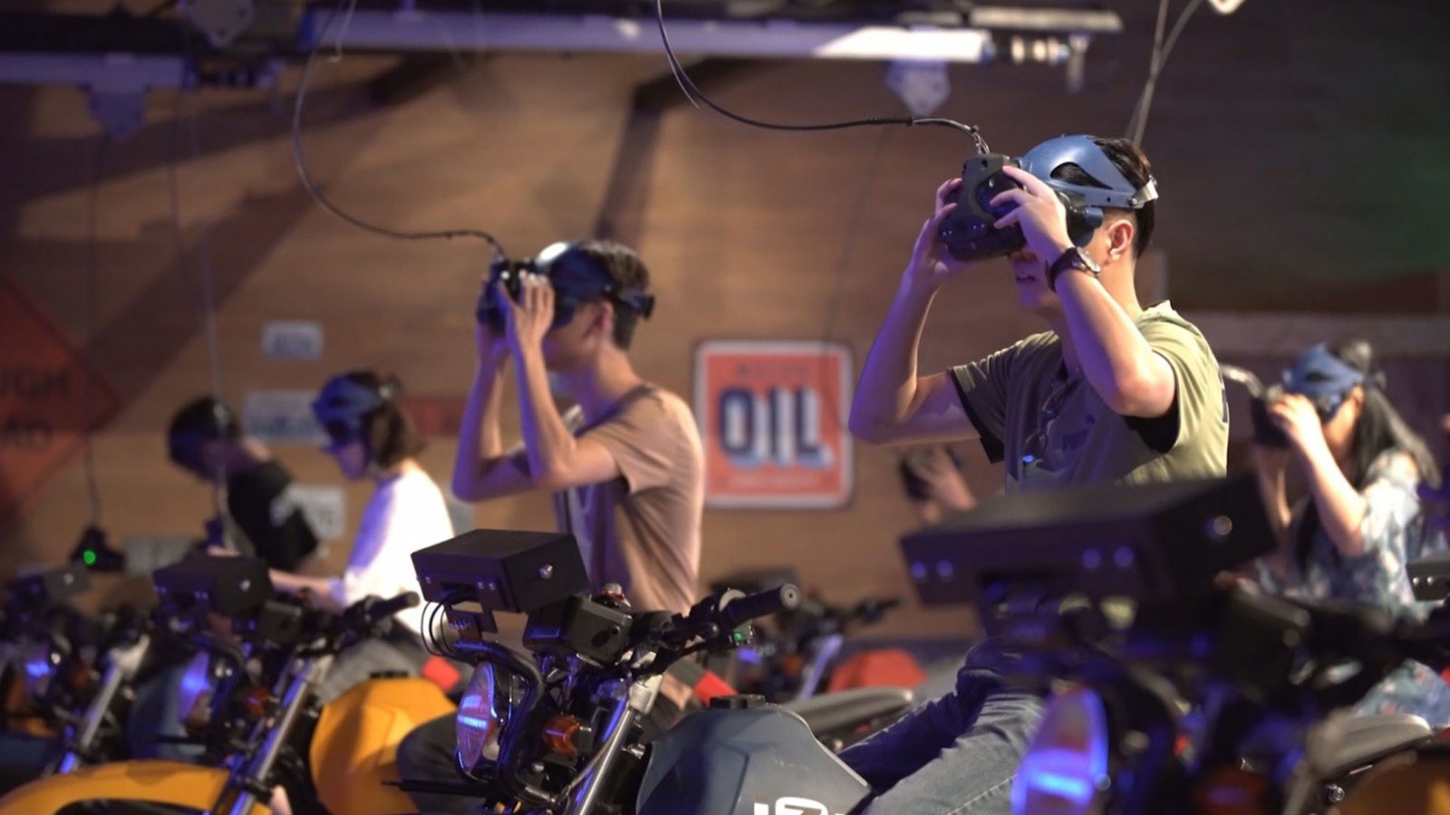 People on motorcylces with VR headsets with Ultraleap tracking technology